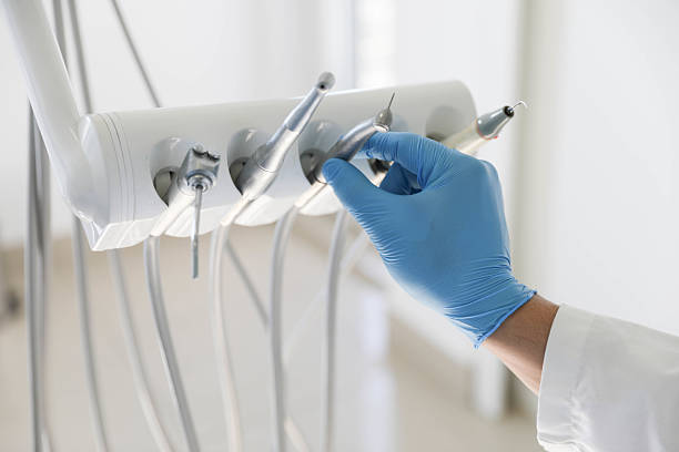 Professional Tooth Extraction technician working in Nashville, IN